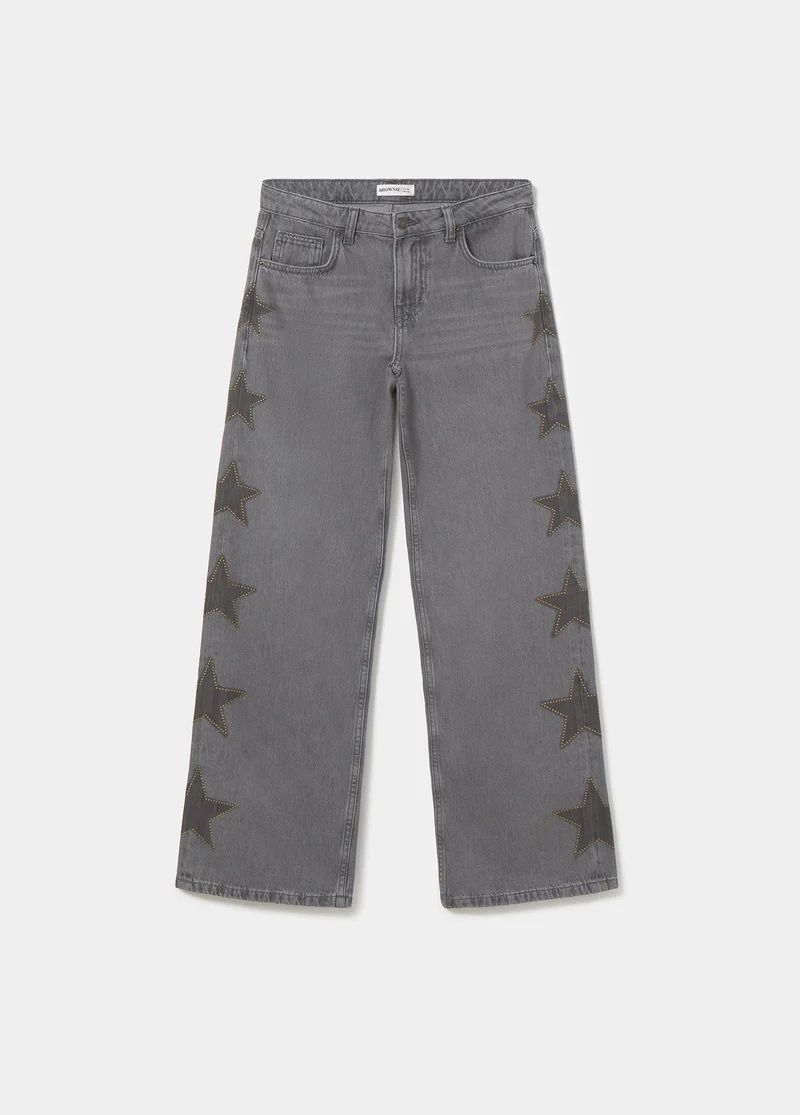 Jeans with stars and side studs