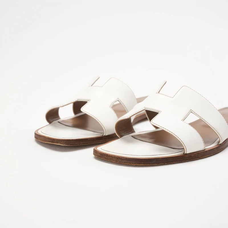 Hermes Oran Sandalen aus weißem Leder, Größe 39.5