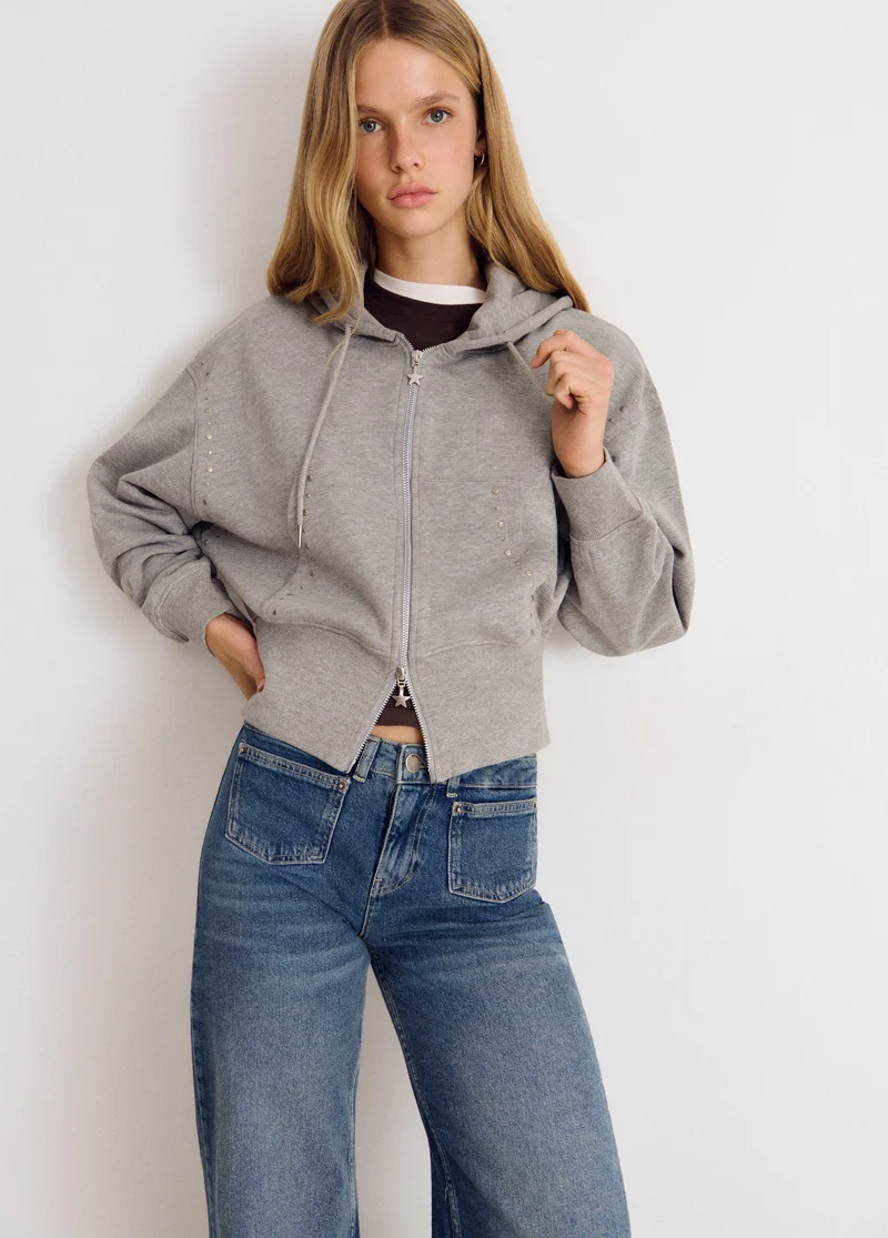Embroidered front-pocket jeans