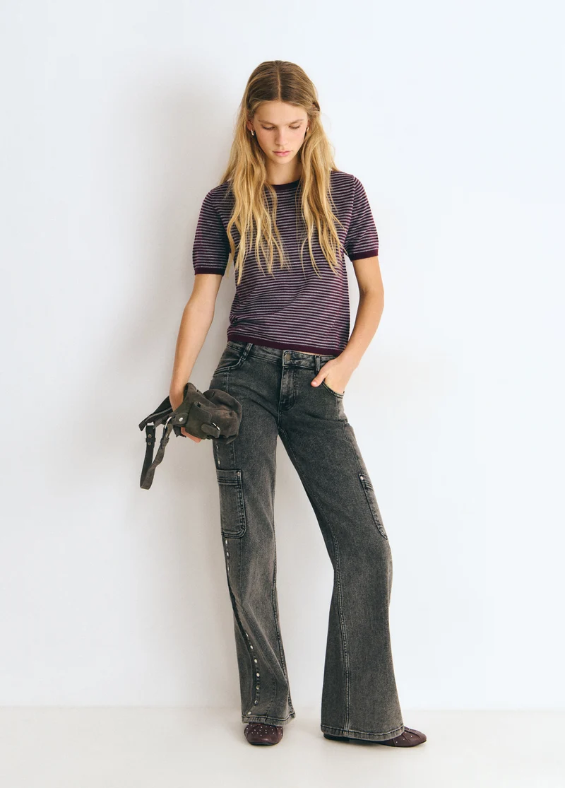 Denim with side studs and a cargo pocket