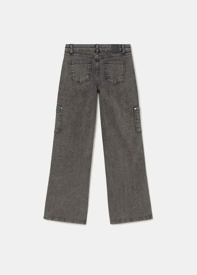 Denim with side studs and a cargo pocket