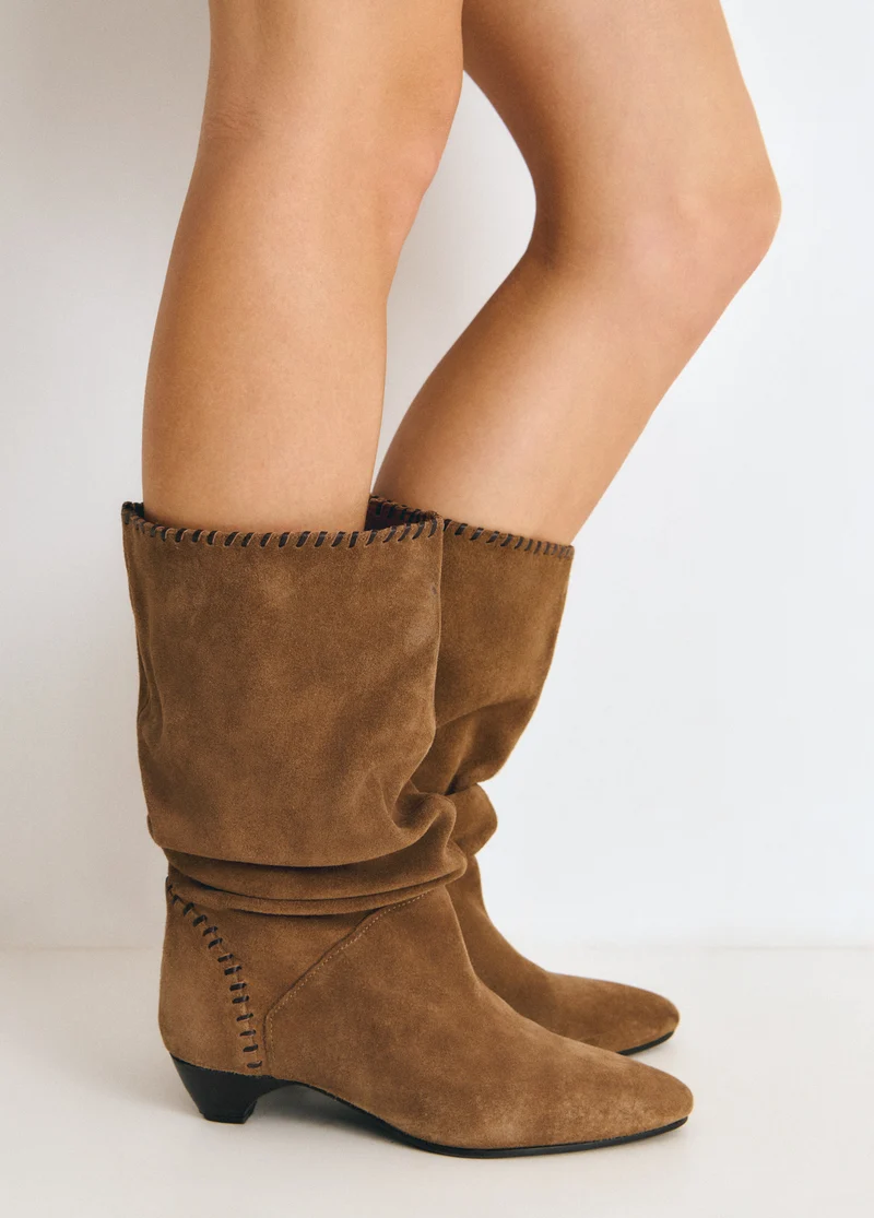 Slouchy boots with kitten heel