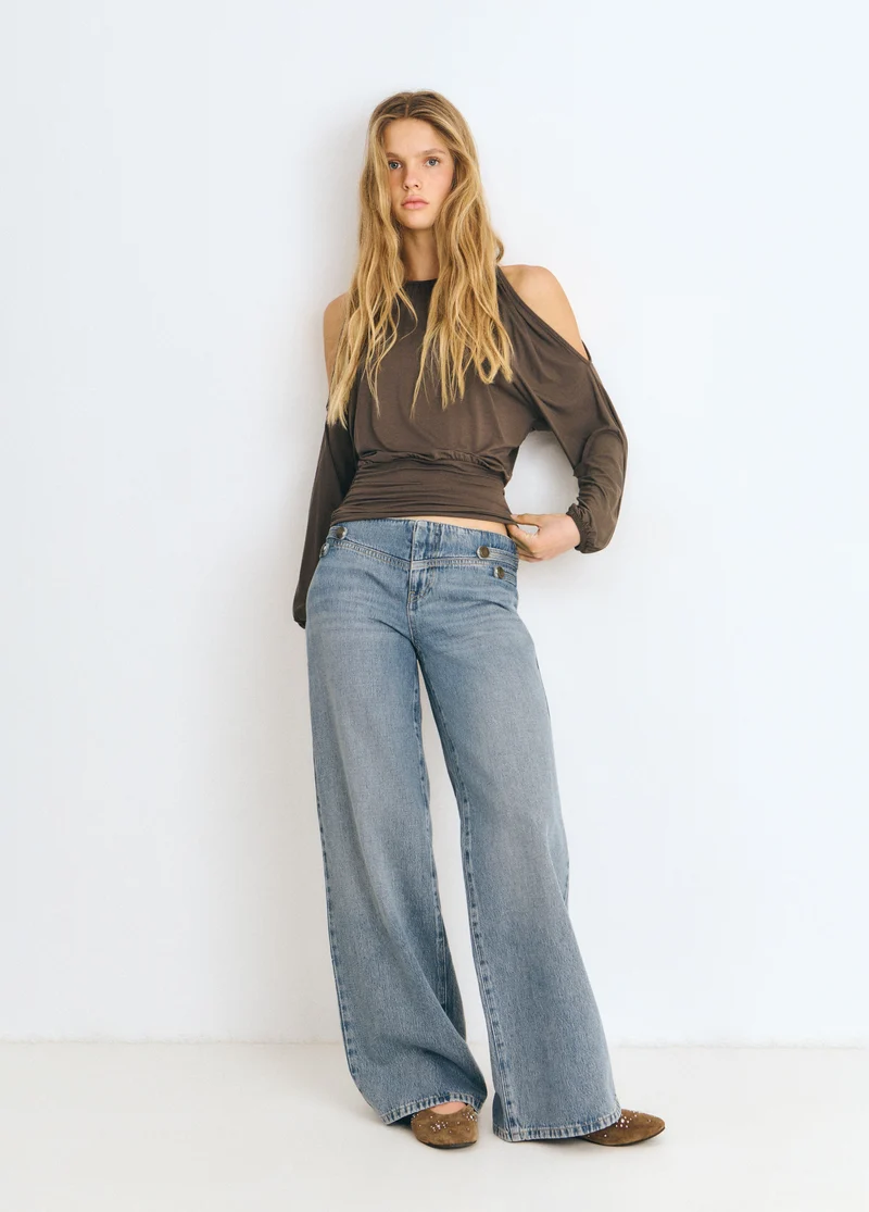 Denim with military-style button details