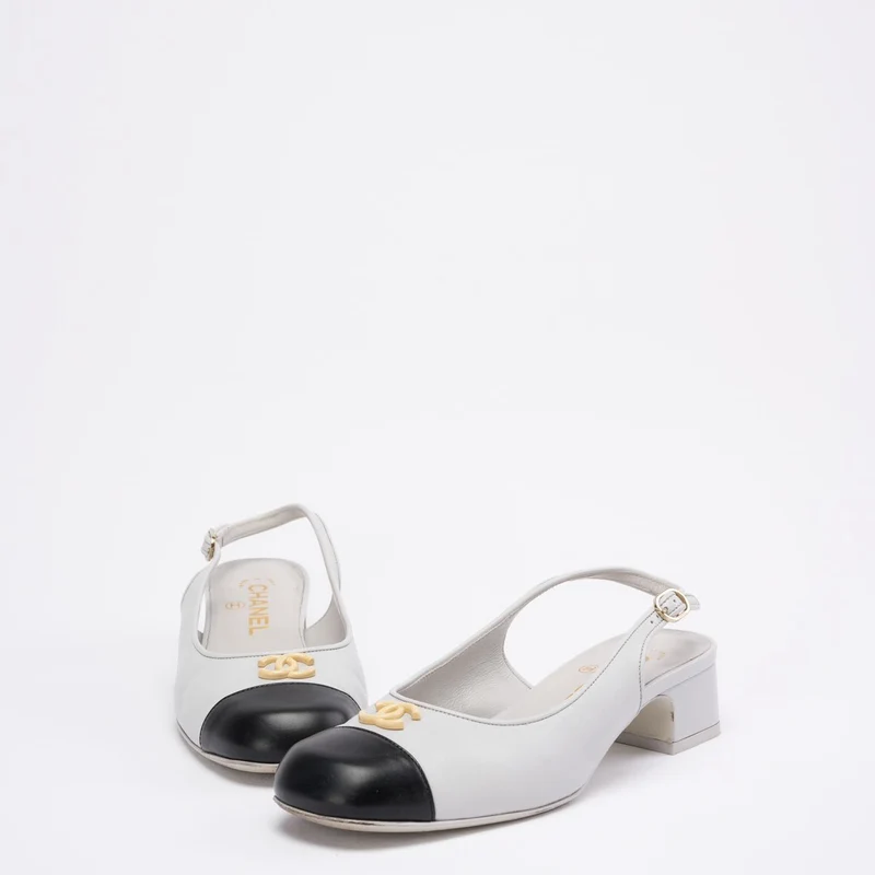 Chanel 25A CC Schwarze/Weiße Leder-Mule mit spitzer Zehenpartie, Größe 37