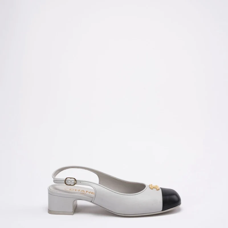 Chanel 25A CC Schwarze/Weiße Leder-Mule mit spitzer Zehenpartie, Größe 37