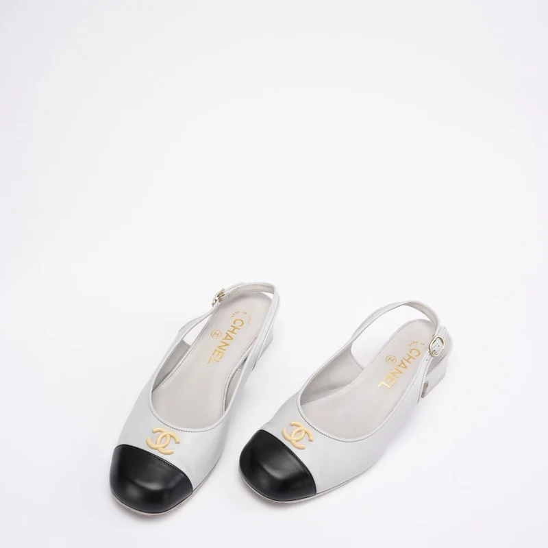 Chanel 25A CC Schwarze/Weiße Leder-Mule mit spitzer Zehenpartie, Größe 37