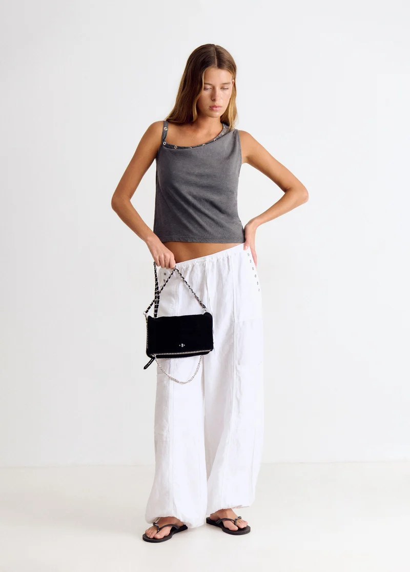 Suede flap bag with beads