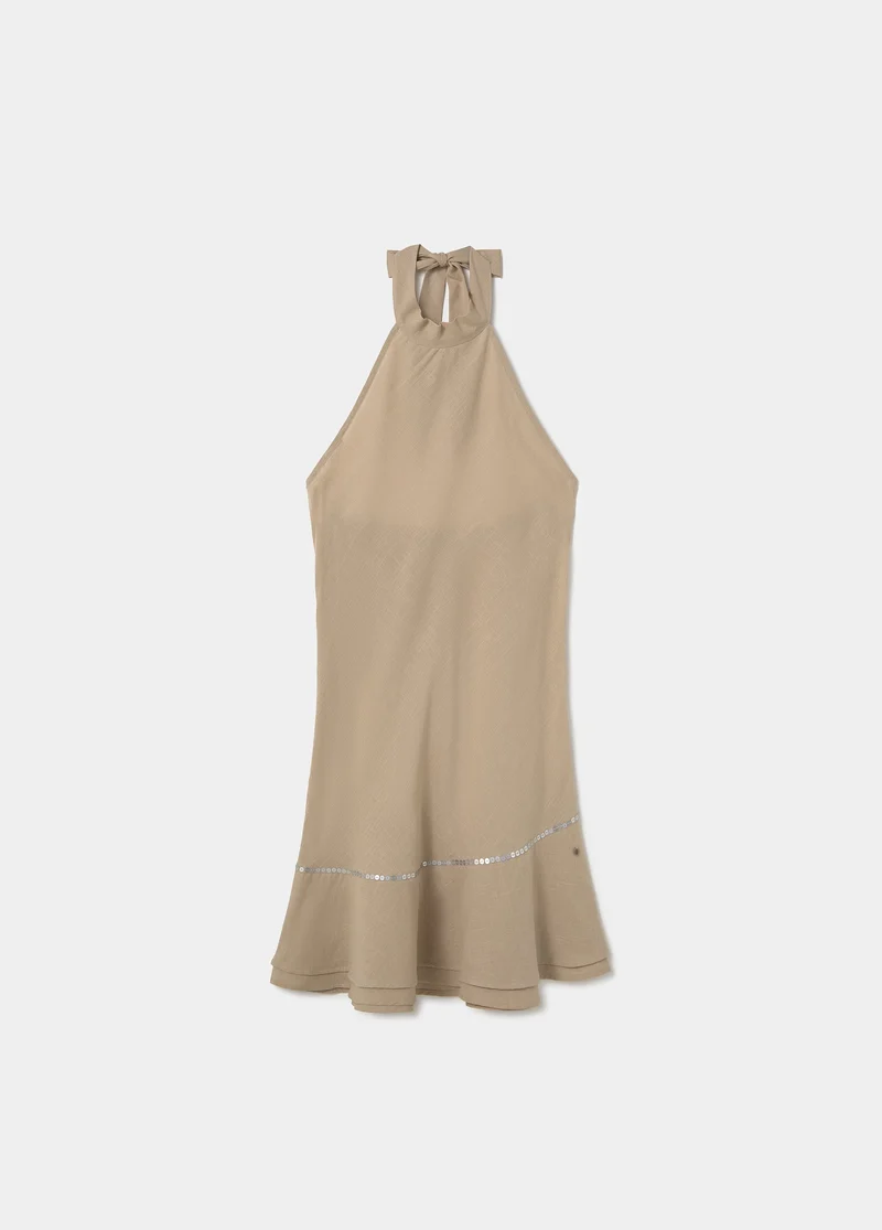 Short dress with asymmetrical hem and draped neckline