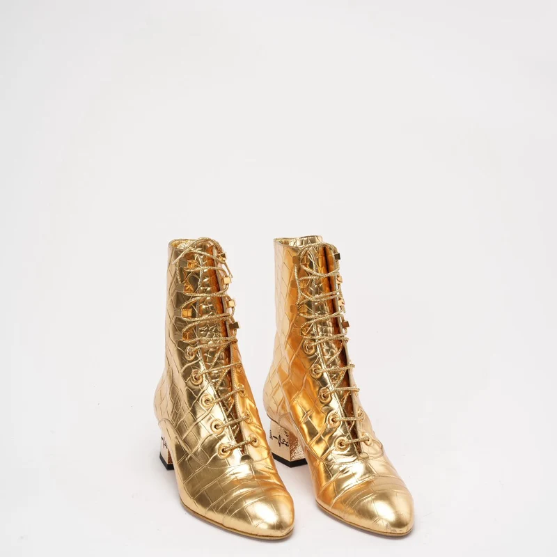 Chanel Leder-Stiefeletten in Gold 37.5
