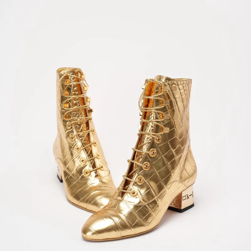 Chanel Leder-Stiefeletten in Gold 37.5