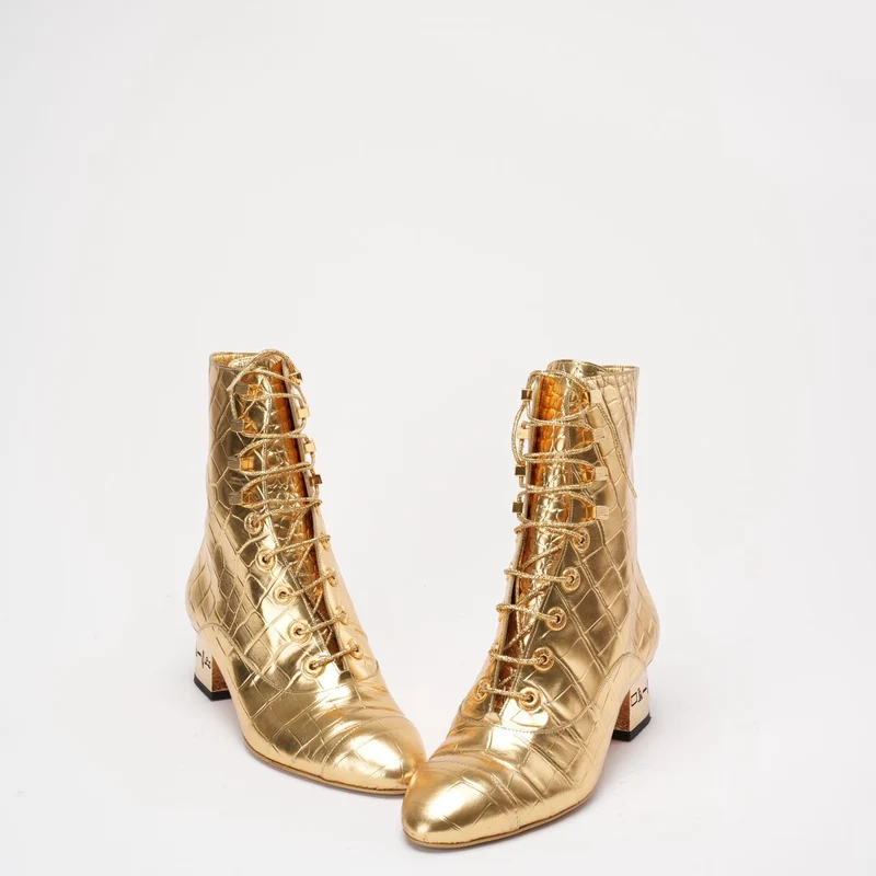Chanel Leder-Stiefeletten in Gold 37.5