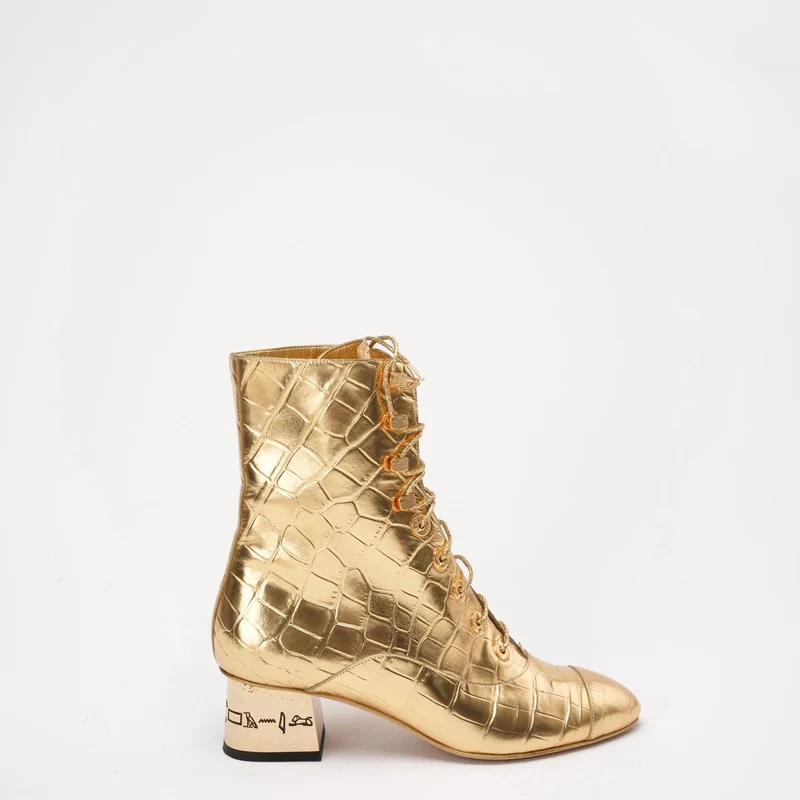 Chanel Leder-Stiefeletten in Gold 37.5
