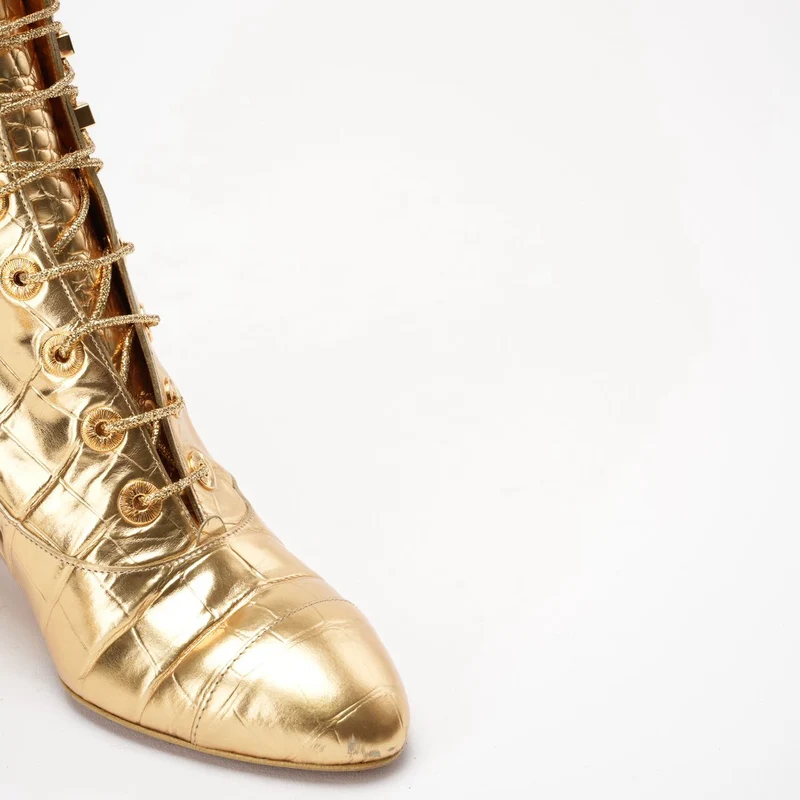 Chanel Leder-Stiefeletten in Gold 37.5