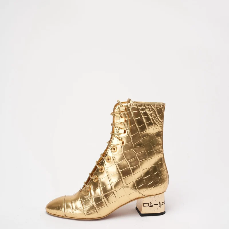 Chanel Leder-Stiefeletten in Gold 37.5