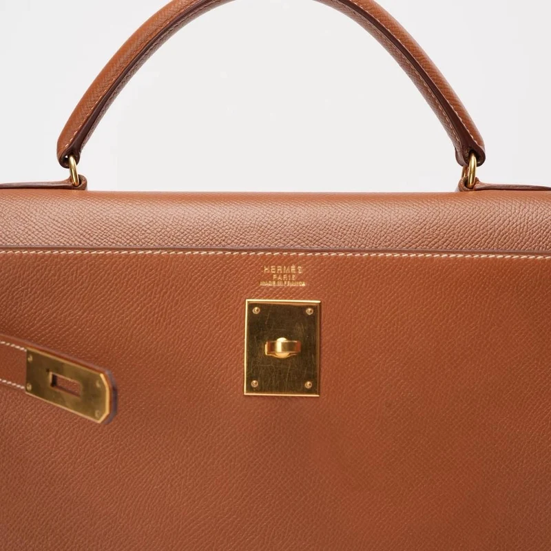 Hermès Vintage Kelly Sellier 32 Gold Leder V Cricle 1992