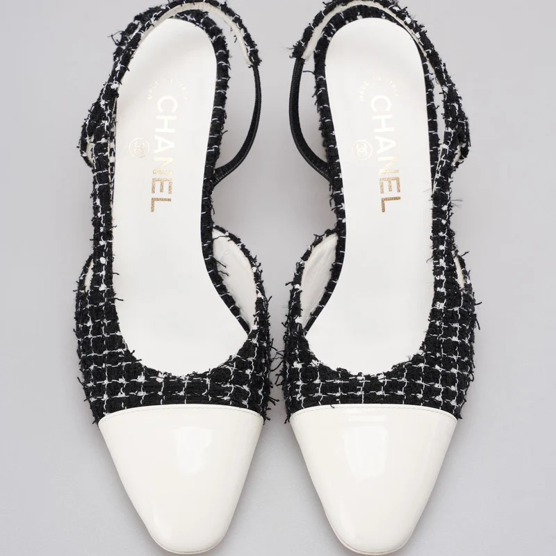 Chanel Schwarze Tweed-Slingback-Pumps mit weißer Zehenkappe 38.5