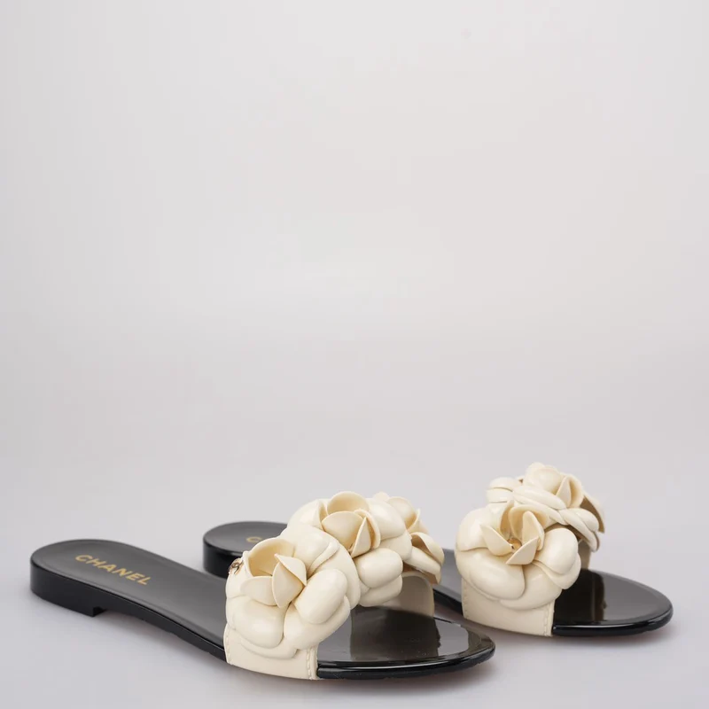 Chanel Schwarz / Weiß Gummi Kamelien Blume Slide Sandalen Größe 36