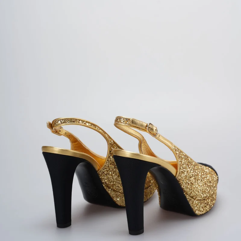 Chanel Grosgrain Cap Toe CC Slingback Pumps Größe 38 in Schwarz und Gold