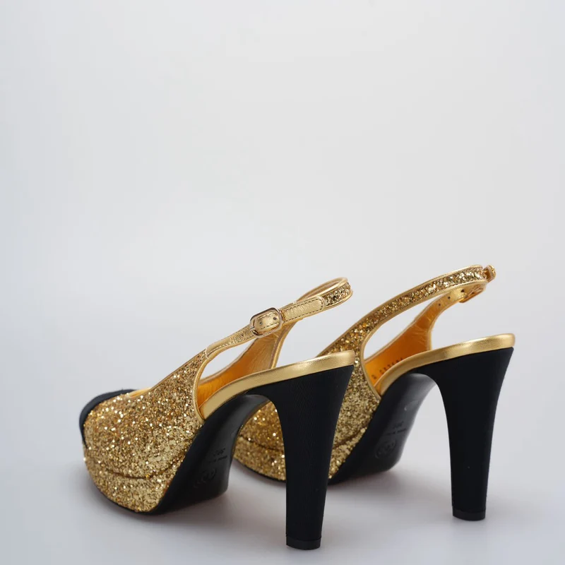 Chanel Grosgrain Cap Toe CC Slingback Pumps Größe 38 in Schwarz und Gold