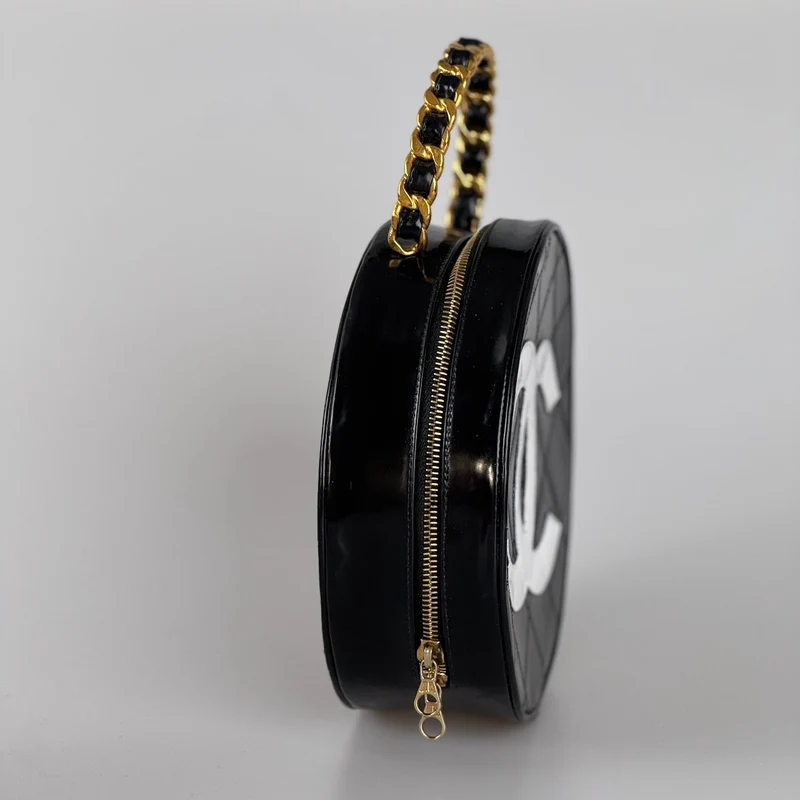 Chanel 1995 Schwarzer runder Kosmetikkoffer