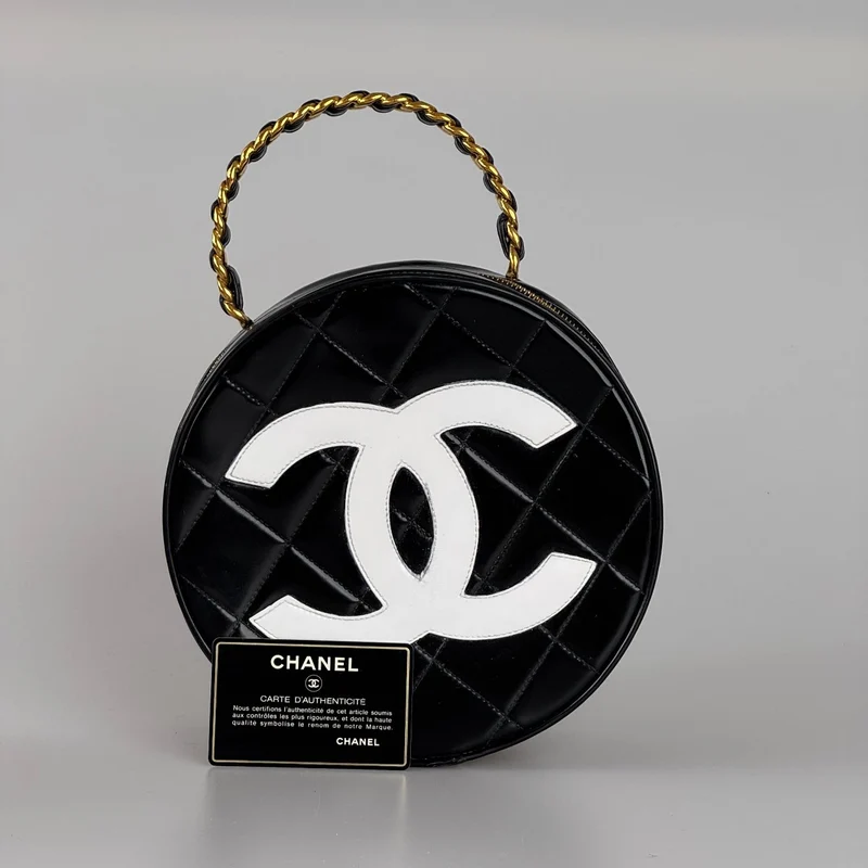 Chanel 1995 Schwarzer runder Kosmetikkoffer
